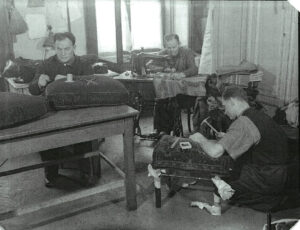 Repair of confiscated upholstered furniture (source: http://collections.jewishmuseum.cz)