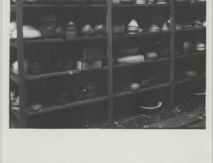 Shelves with glass shades in the Treuhandstelle warehouse (source: http://collections.jewishmuseum.cz)