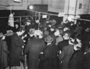 A queue at the counter of Jewish Religious Community in Prague (source: http://collections.jewishmuseum.cz)